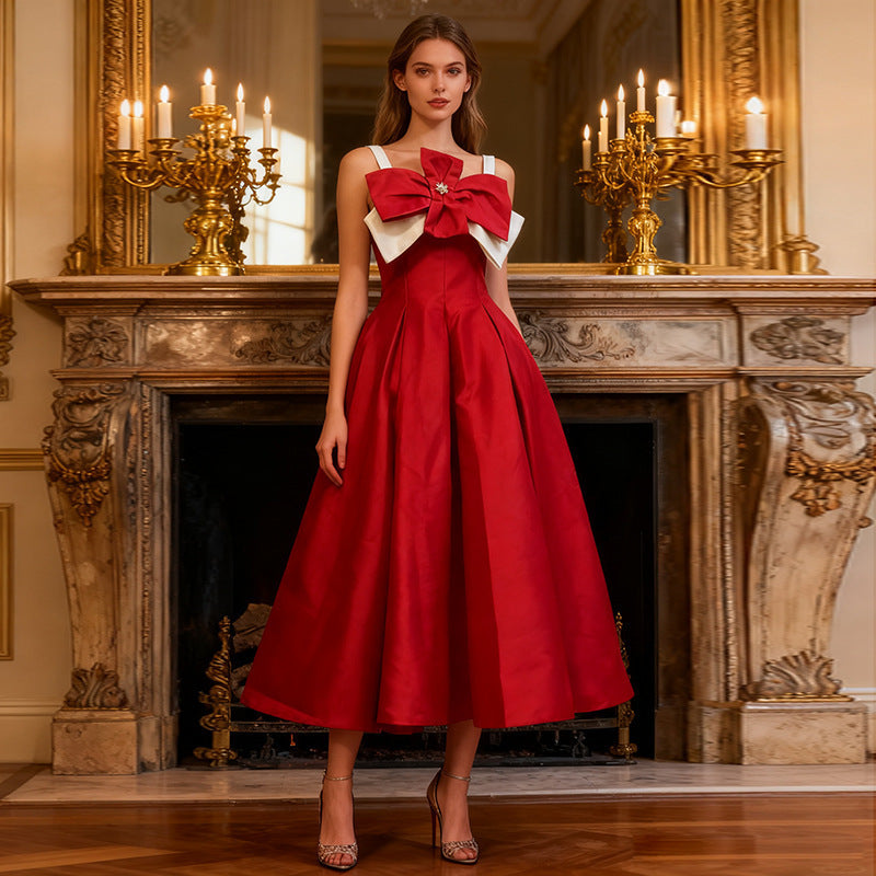 Emerald Elegance Bow Gown